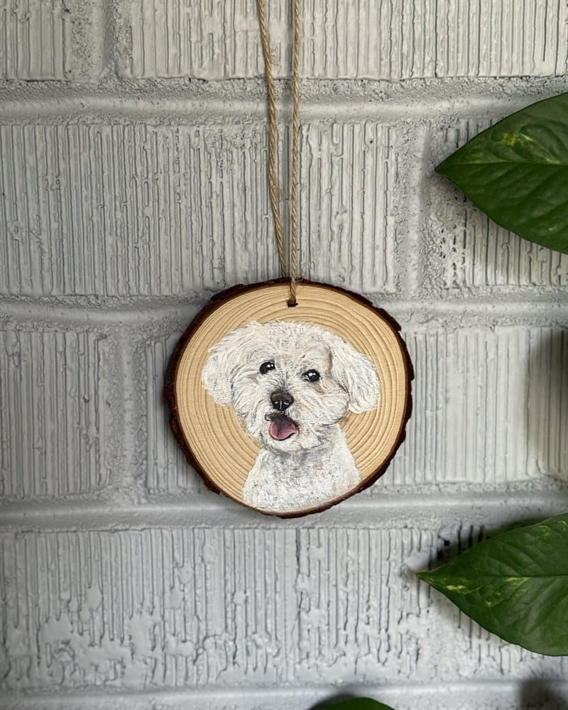Hand-painted white Maltese puppy on a wood round ornament